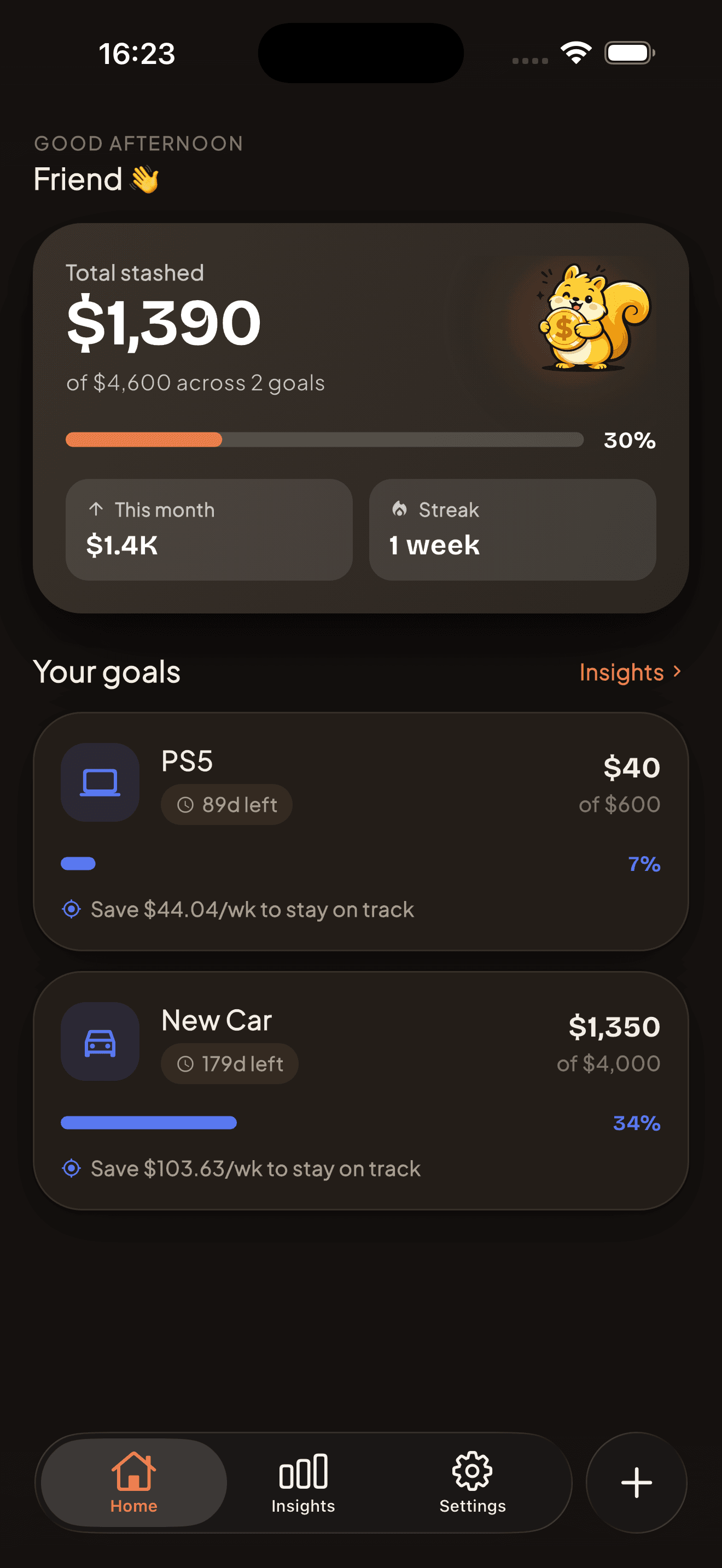 Stash home screen showing total stashed, a savings streak, and two goals with progress bars